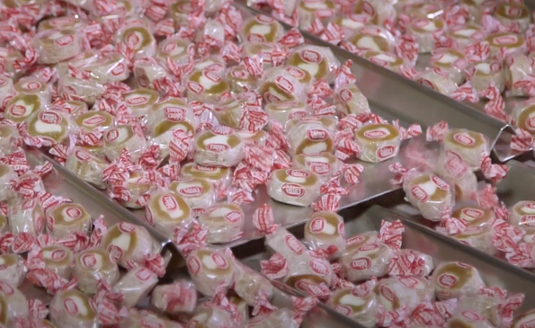 Wrapped candy on a Triangle weigher machine.